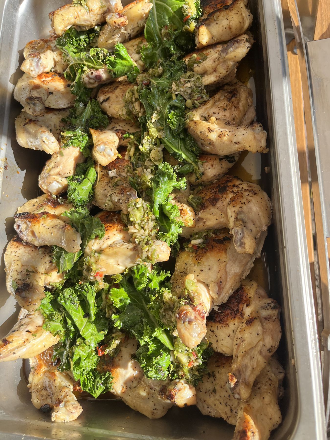 Grilled chicken with chimichurri and charred kale