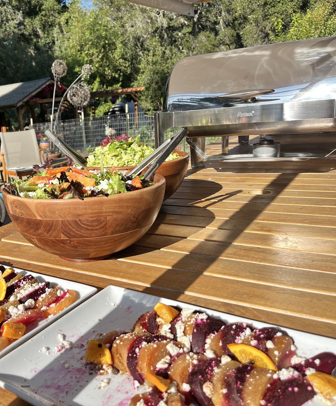 Oakmont catering spread set up for an outdoor estate event