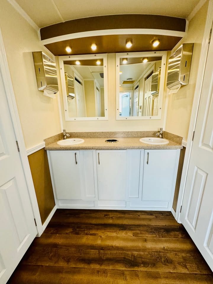 Interior of the Oakmont luxury restroom trailer with double vanity