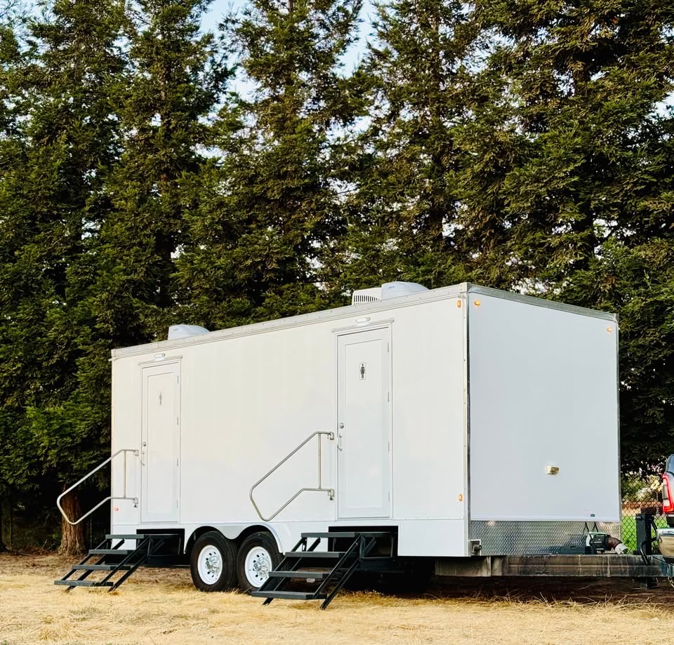 Oakmont luxury restroom trailer set up at an outdoor event